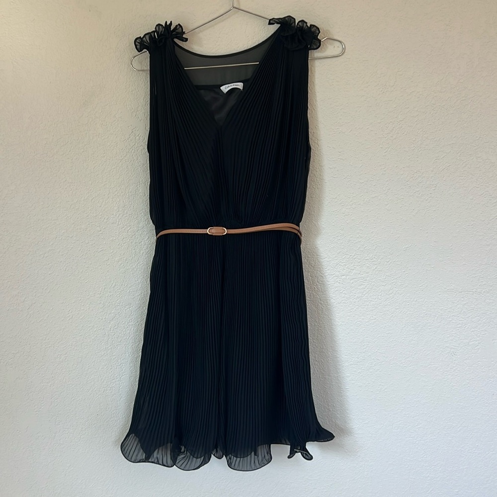 Super cute little black dress with flounce